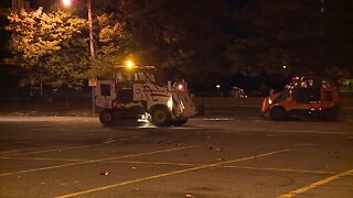 Crews clean up Muni Lot after home opener