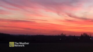 Pink hues fill the sky in stunning Autumn sunset