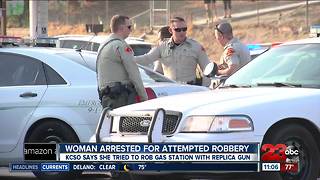 Woman attempts to rob gas station with replica gun
