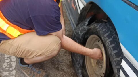 Saved by Angels! We lost a tire on a dangerous road while driving our rickety bus to Medan. Part 1