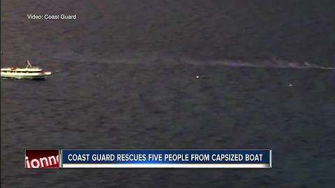 Coast Guard rescues 5 people from capsized boat