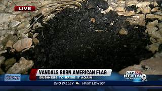 Vandals burn American flag, dealership to raise it again