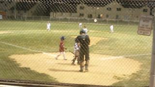 Young Boy Hits Baseball On Field And Runs All The Way Around The Bases