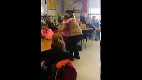 Soldier returns home from boot camp, surprises younger cousin at school