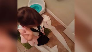 Little Girl Takes Care Of Bathroom Business