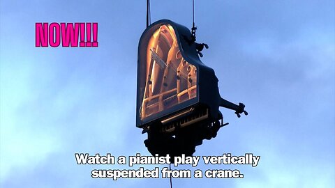 Watch a pianist play vertically suspended from a crane.