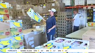 Volunteers help at Midwest Food Bank in Fort Myers