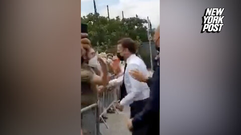 French president Macron smacked in the face while greeting constituents