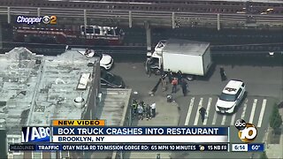 Box truck crashes into restaurant in New York