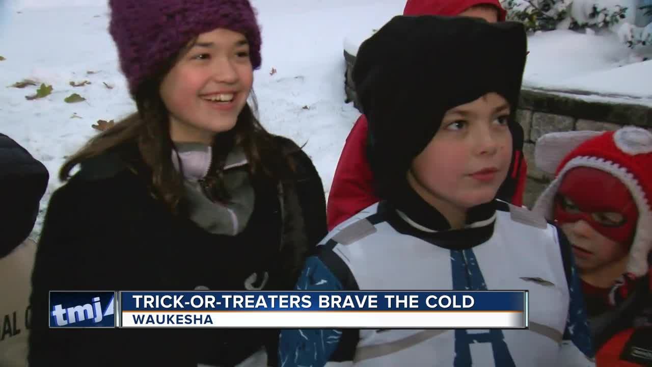 Despite cold and snow, trick-or-treating continues in Waukesha