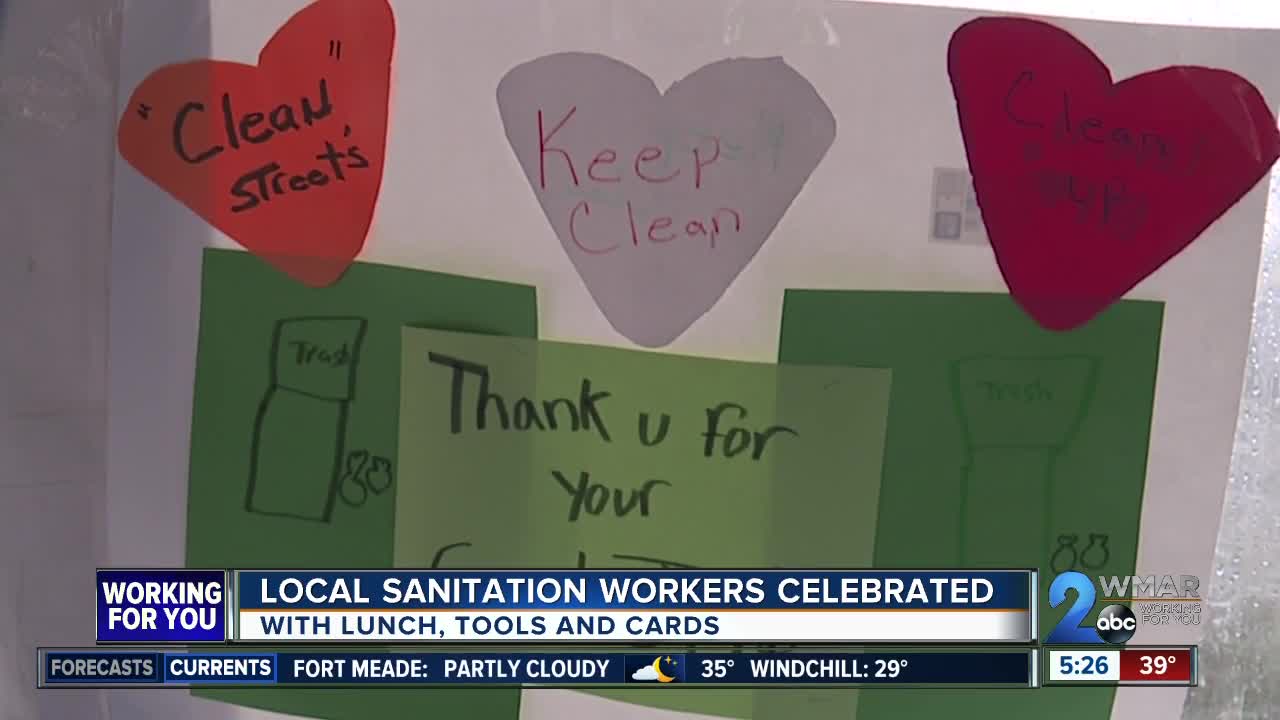 Local sanitation workers celebrated with lunch, tools and cards