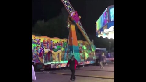 People Rush to Stop Carnival Ride From Toppling Over