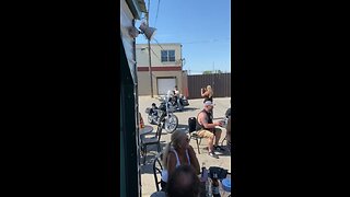Man takes his dog for a ride on his Harley-Davidson