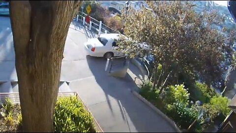 Possible Stolen Car Smashes Thru Gate Plunges Down Hill Over Stairs