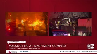 Firefighters battle third-alarm apartment fire