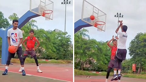 Basketball Player Performs Epic Trick Shot