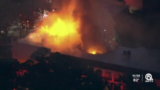 Crews battle large fire at apartment complex near West Palm Beach