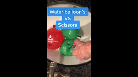 POPPING Water Balloons with Scissors!!