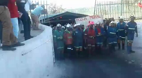 Jubilant workers emerge from underground after ending a nine-day sit-in at Rustenburg mine (BUB)