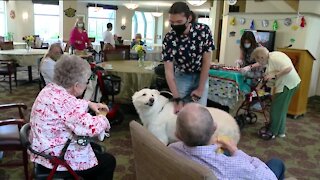 Students living with seniors celebrate graduation