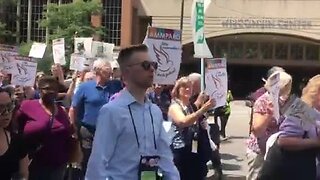 Hundreds protest President Trump's immigration policies in downtown Milwaukee Wednesday