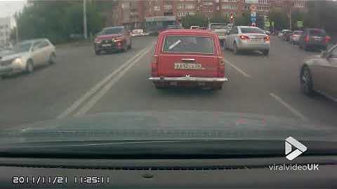 These Russian Dudes Stop Their Car In Fred Flintstone Style
