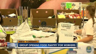 Group opening food pantry for workers