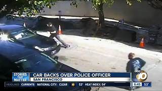 Car backs over police officer in San Francisco