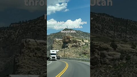 This highway literally cuts right through this Utah mountain!