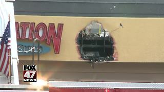 Fire under investigation near sub shop in Lansing