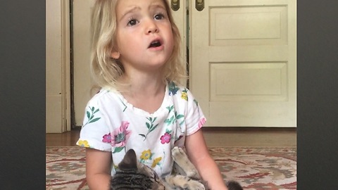 Toddler And Kitten Sing 'Somewhere Over The Rainbow'