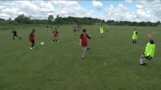 Soccer camp adjusts to the times