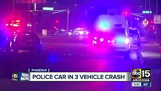 Police car involved in multi-vehicle wreck