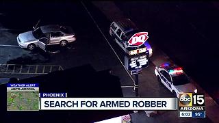 Police searching for armed robbery suspect