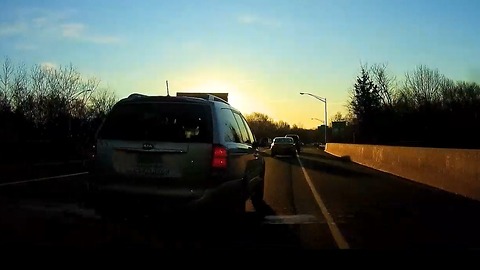 Dashcam captures near collision with school van full of kids
