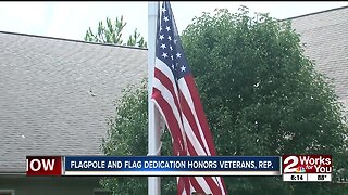 Flagpole and flag dedication honors veterans