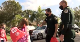 St. Lucie County Sheriff's Office 'Santa Cop' brings cheer to hundreds of children and one special family