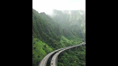 An Elevated Highway In The Mountain Valley In Hawaii