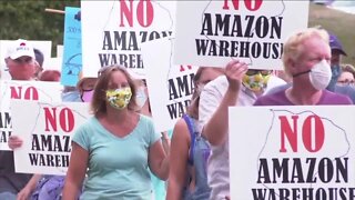 Dozens protest Amazon plans outside of Grand Island Town Hall