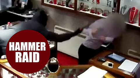 Shocking footage shows thugs bursting into jewellers and battering shop worker with a HAMMER