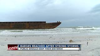 Storm leaves 40-ton barge on St. Pete beach