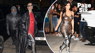 Julia Fox takes Kim Kardashian's silver boots for a spin with Kanye West