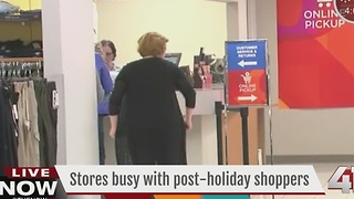 Stores busy with post-holiday shoppers