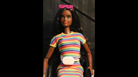 Barbie Fashionistas Doll #166 with Wheelchair & Crimped Brunette Hair Wearing Rainbow-Striped D...