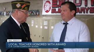 Local teacher honored with award