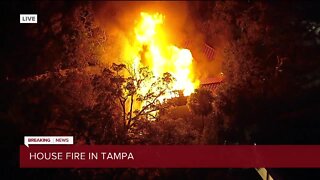 Tampa Fire Rescues battles large house structure fire