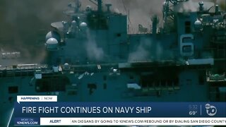 Progress being made as crews continue to battle Navy ship fire