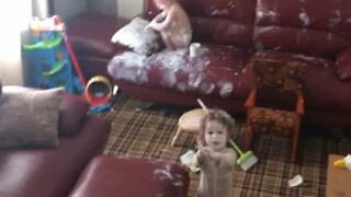 Tots spread cream all over themselves and the house