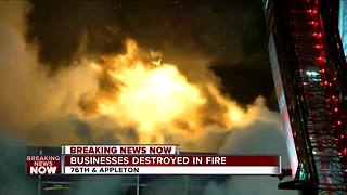 Milwaukee fire crews fight blaze at north side store front