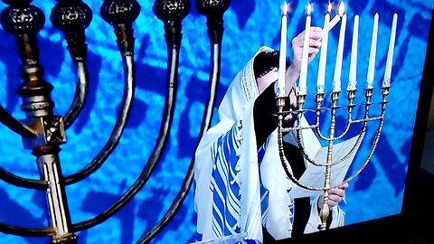 Jonathan Cahn lighting the menorah